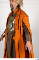  Photos Medieval Knight in cloth armor 2 Knight Medieval clothing gambeson orange cloak upper body 0002.jpg